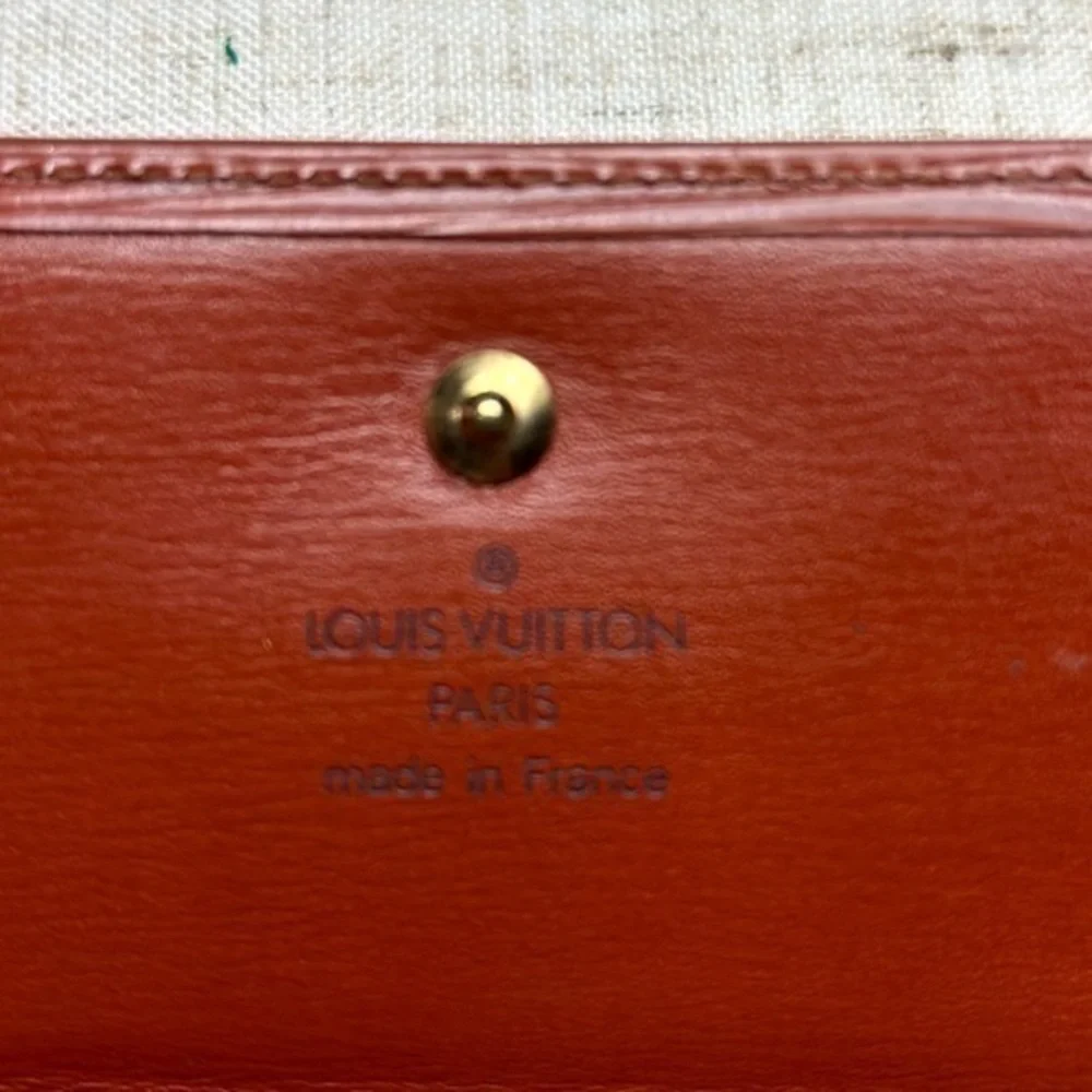 AUTHENTIC Louis Vuitton Marco Wallet. Color: Brown.